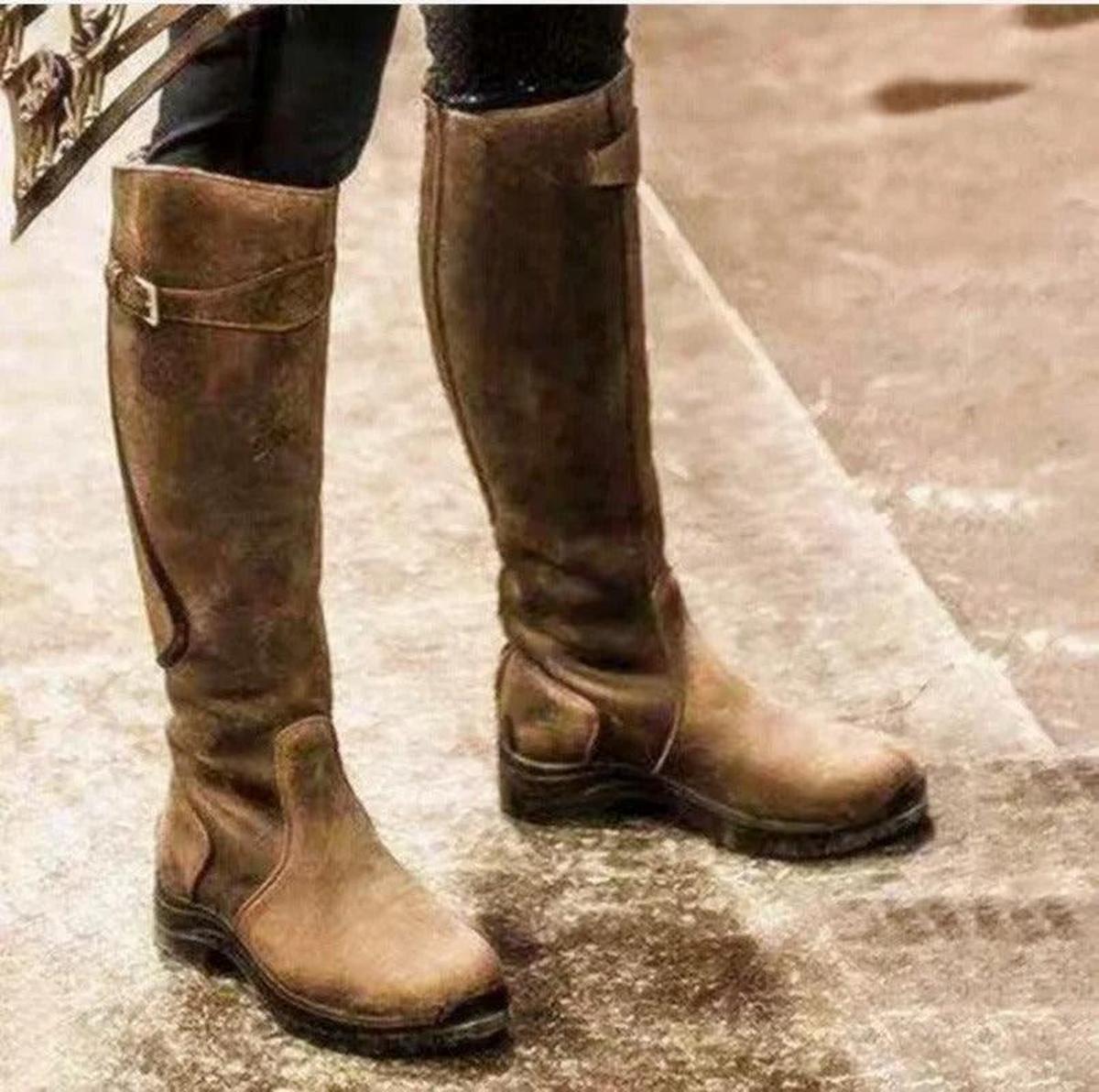 Women's waterproof leather riding boots with adjustable side straps and rugged grip sole for winter