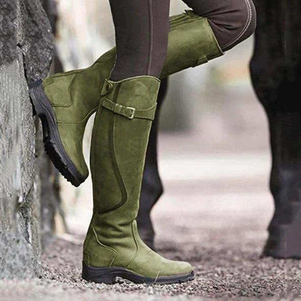 Women's waterproof full-grain leather riding boots with adjustable side straps and rugged grip sole
