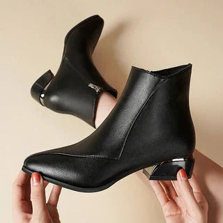 Women's black block heel boots with side zipper closure, sleek streamlined silhouette for everyday elegance