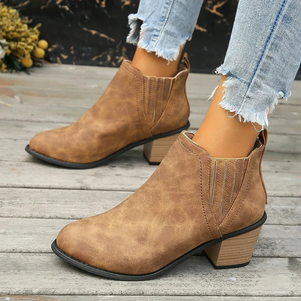 Women's low calf boots neutral tone side zip closure sleek silhouette everyday comfort busy lifestyle