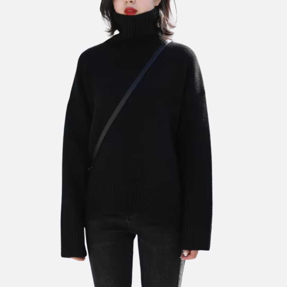 Women's dark chocolate oversized turtleneck sweater with high ribbed neck and medium-weight cozy knit