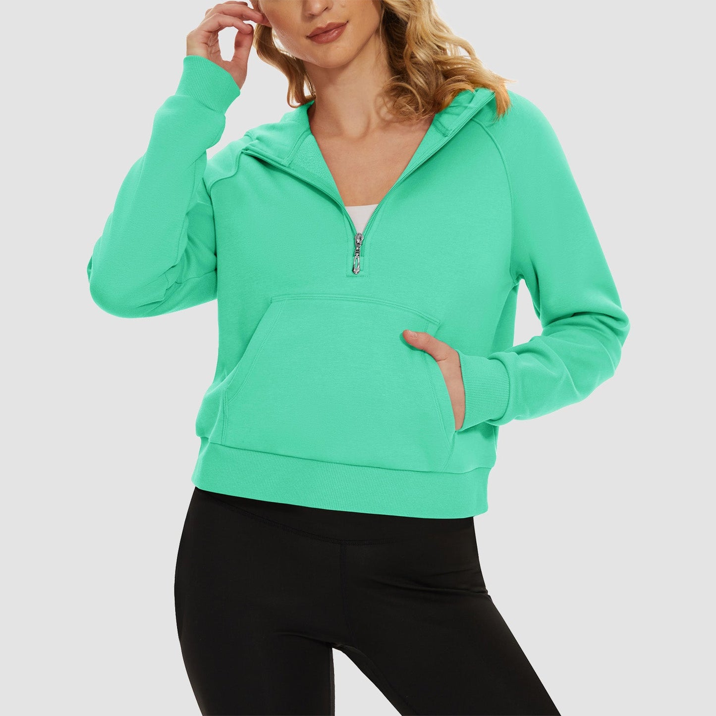 Women's cropped fleece hoodie half-zip with kangaroo pocket, cozy polyester-cotton blend for active wear