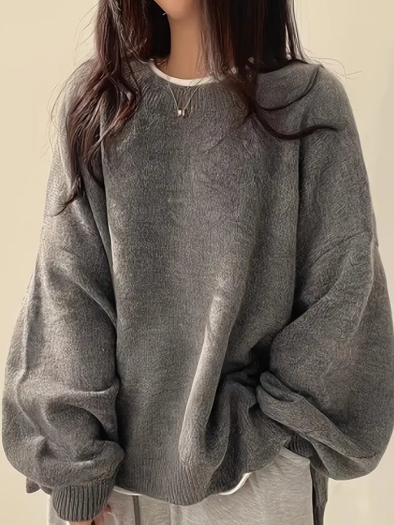Oversized women's sweater with lantern sleeves, round neck, cozy knit layer for autumn