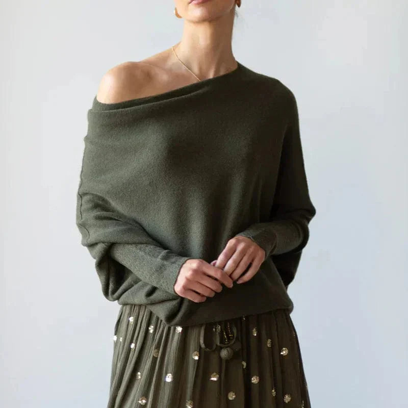 Women's oversized boat neck knit jumper with batwing sleeves and draped silhouette in cozy fall style
