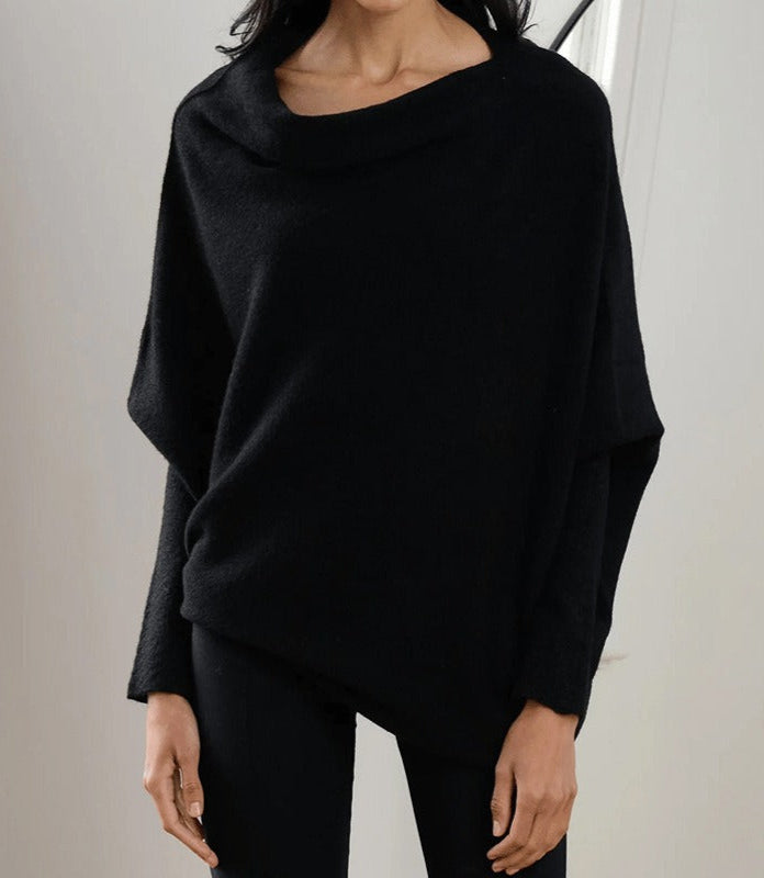 Women's oversized boat neck knit jumper with batwing sleeves and draped silhouette cozy autumn layer