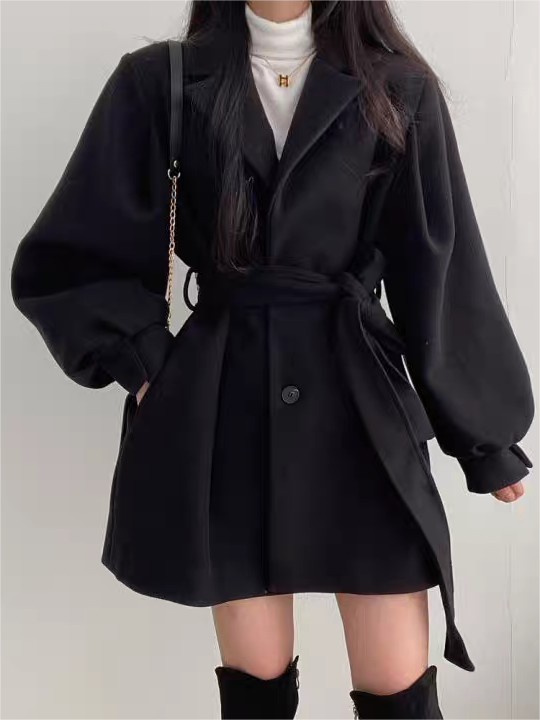 Women's short A-line belted coat with puff sleeves, lapel collar, and chic button front closure