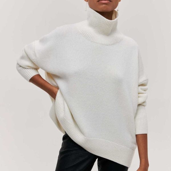 Women's oversized turtleneck sweater with deep roll neck, elbow sleeves, and ribbed trims in cozy knit