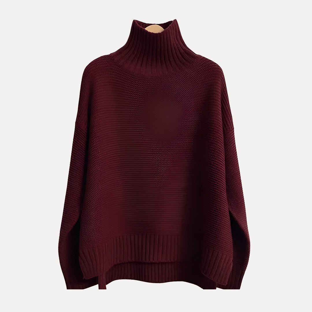 Women's relaxed-fit turtleneck sweater with ribbed detailing and side slit hem for effortless layering