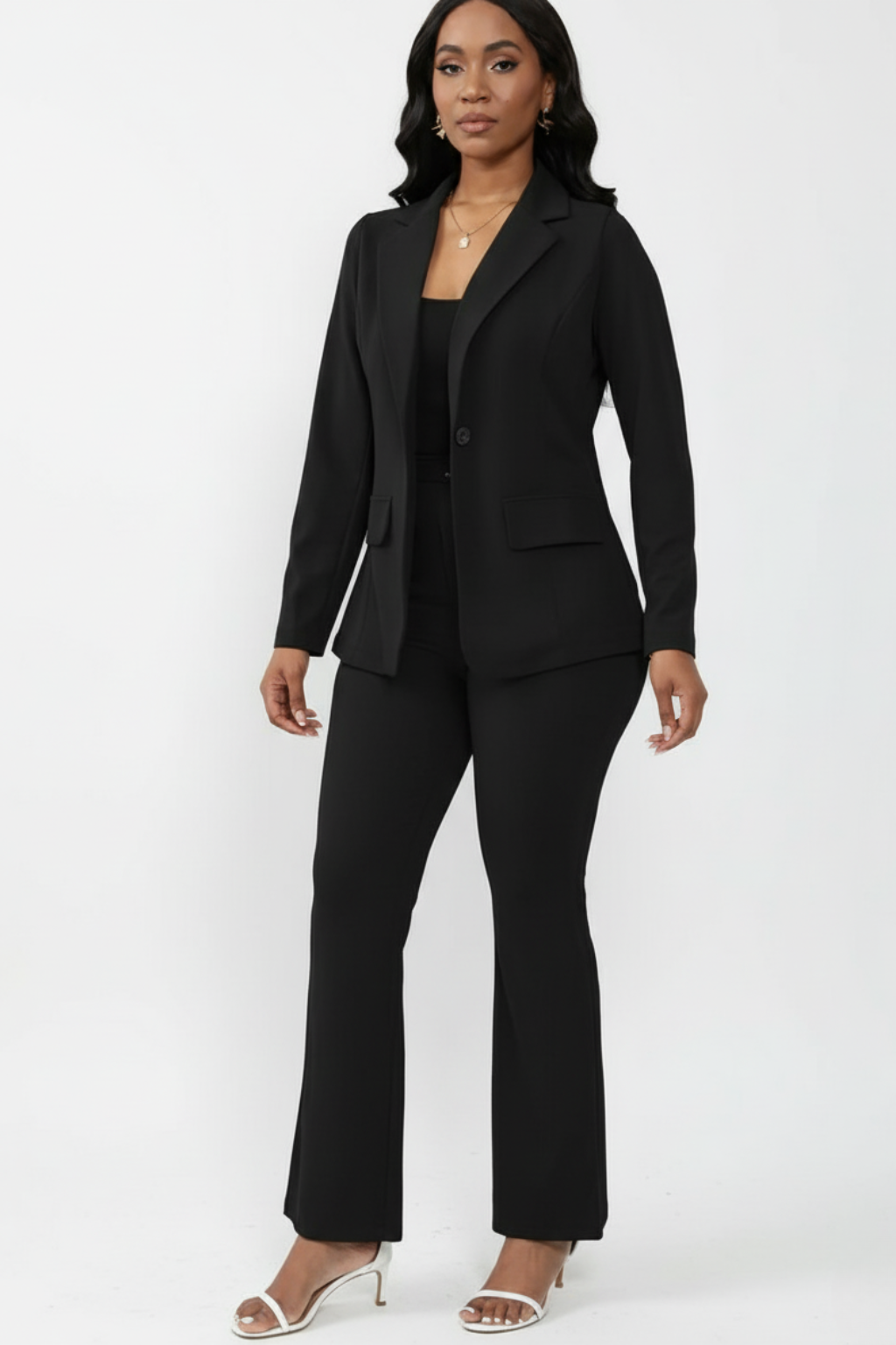 Women's tailored two-piece suit structured blazer straight trousers polished professional silhouette