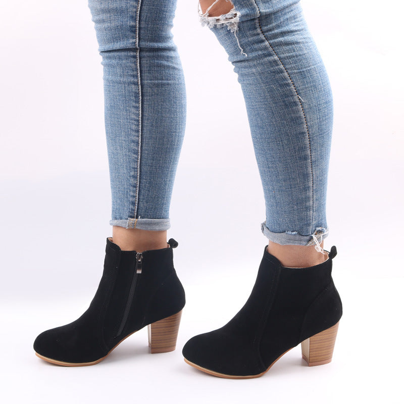 Women's black casual ankle boots with block heel and side zip closure for all-day comfort