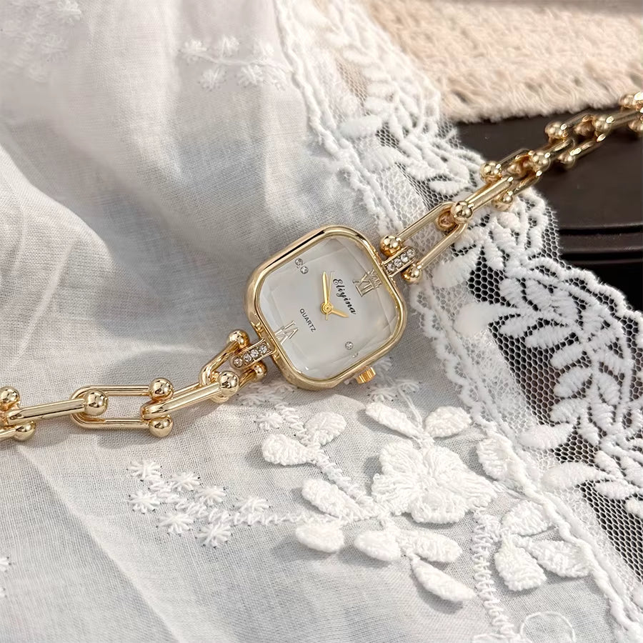 Women's baroque chain-link bracelet watch bold square dial chunky sculptural gold-tone timepiece