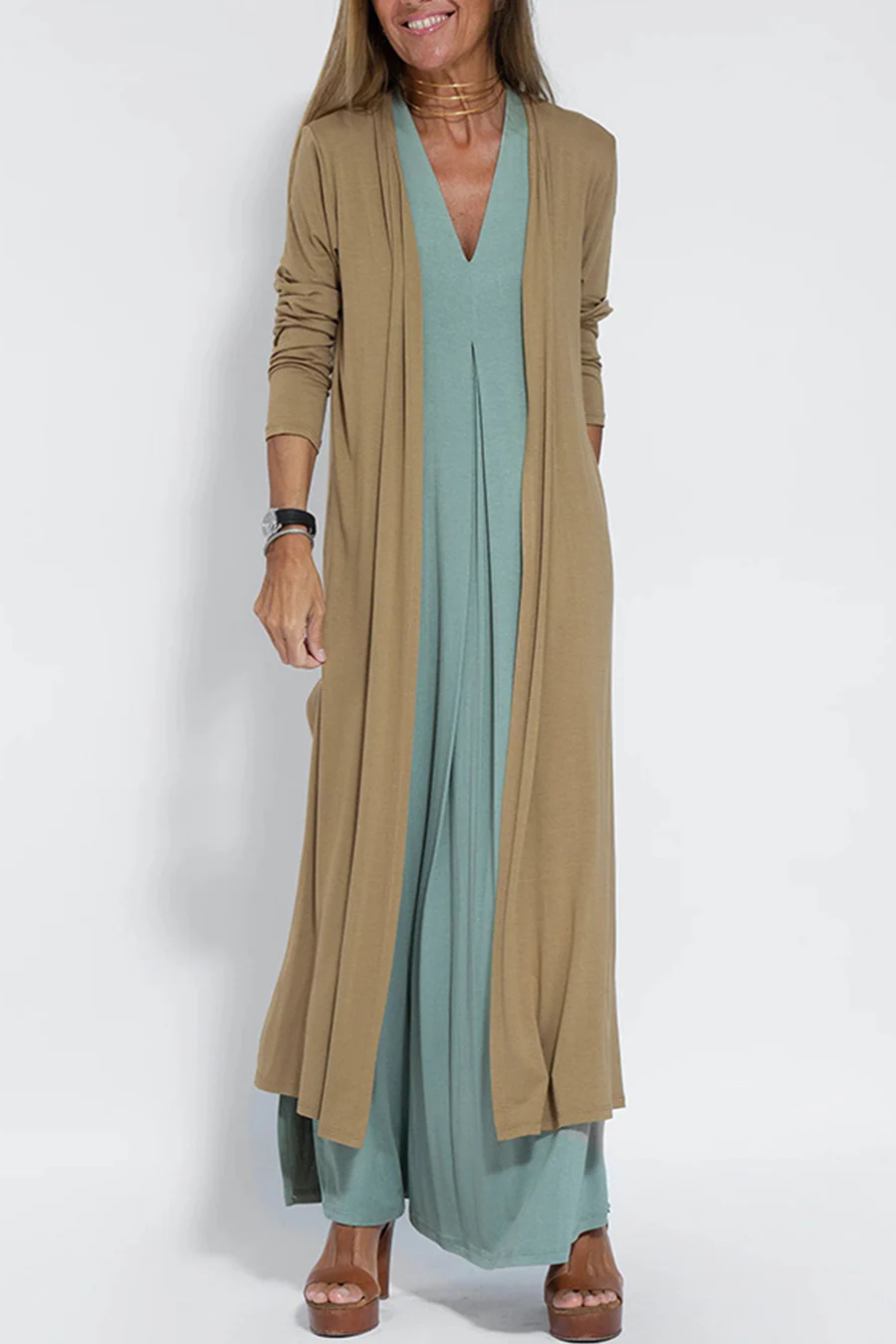 Women's solid color V-neck cardigan with ruched detail, long slit hem, and regular fit silhouette