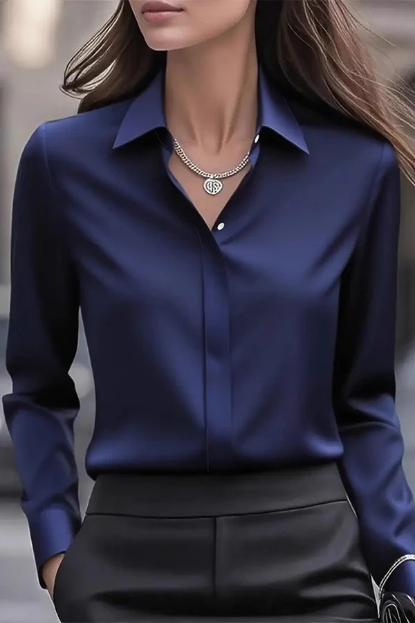 Women's loose fit hip-length satin lapel long sleeve shirt in versatile office-ready professional style
