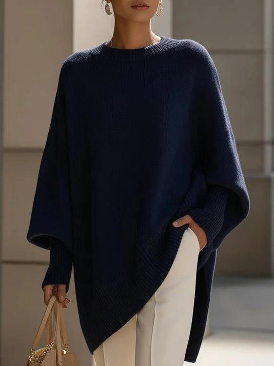 Women's oversized cozy sweater in neutral draping silhouette with effortless relaxed luxe fit