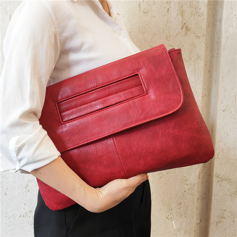 Large capacity magnetic clutch bag with crossbody strap, square silhouette urban commuter style