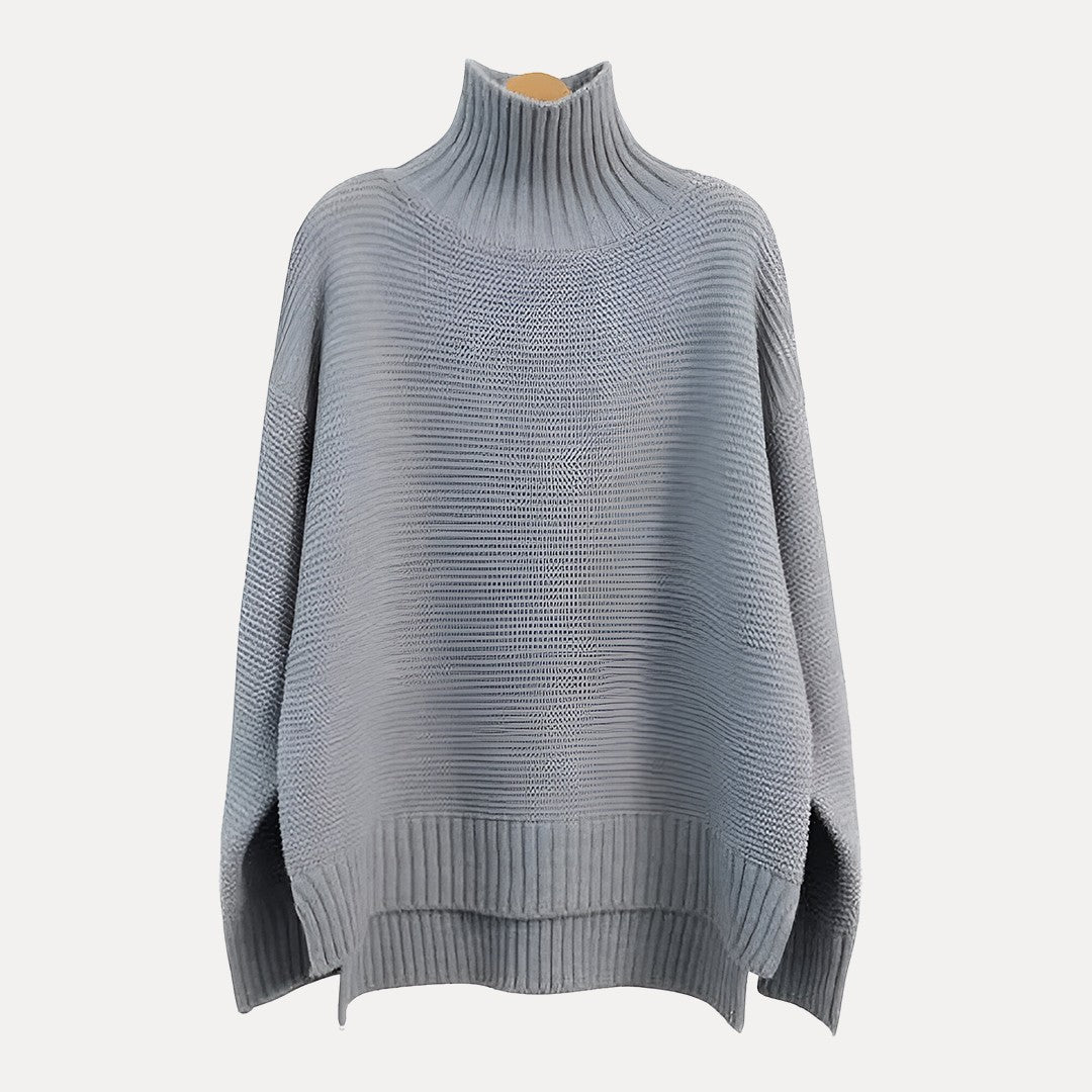 Women's ivory wool oversized turtleneck sweater with ribbed side slits for modern winter style