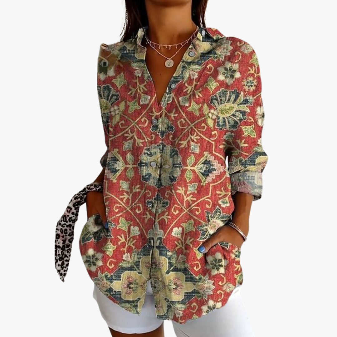 Women's white linen blouse with handcrafted embroidery, relaxed artisan cut for timeless elegant style
