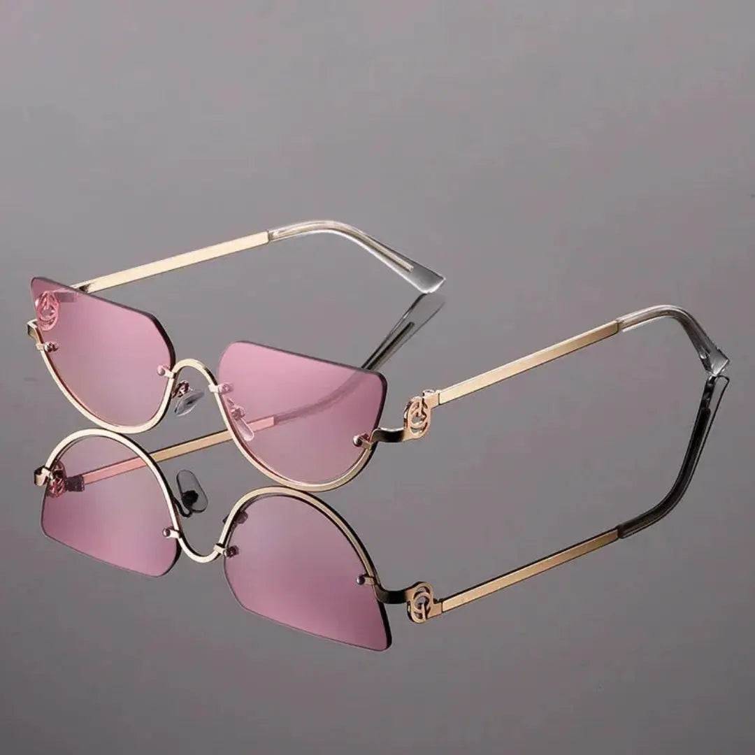 Women's rimless cat-eye tinted sunglasses gold-tone frame retro glam UV protection bold fashion