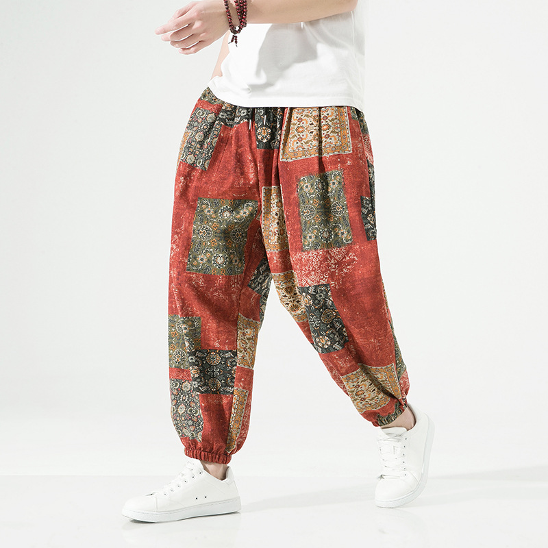 Beige linen-blend tapered pants with drawstring waist, relaxed fit for effortless warm-weather style