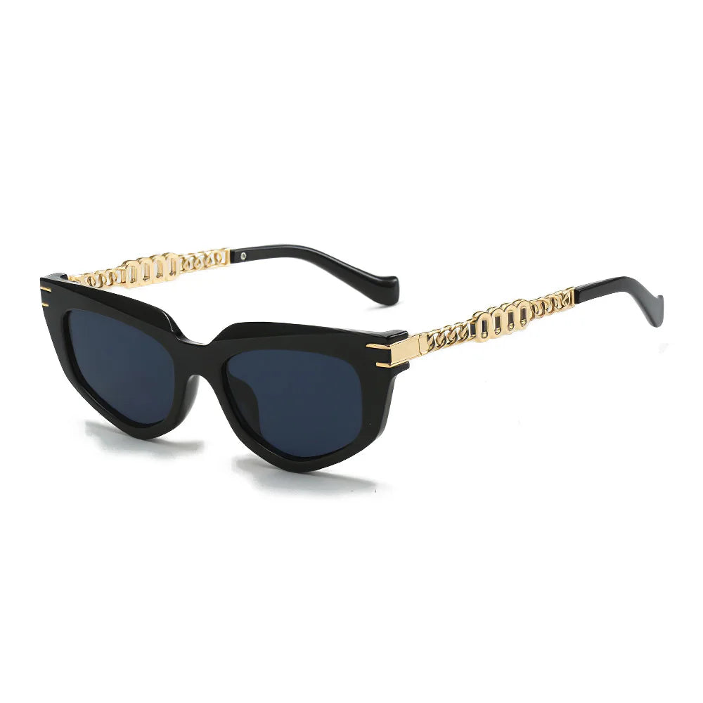 Chunky cat-eye sunglasses gradient brown lenses green ombré tips gold chain-link arms glamorous UV protection