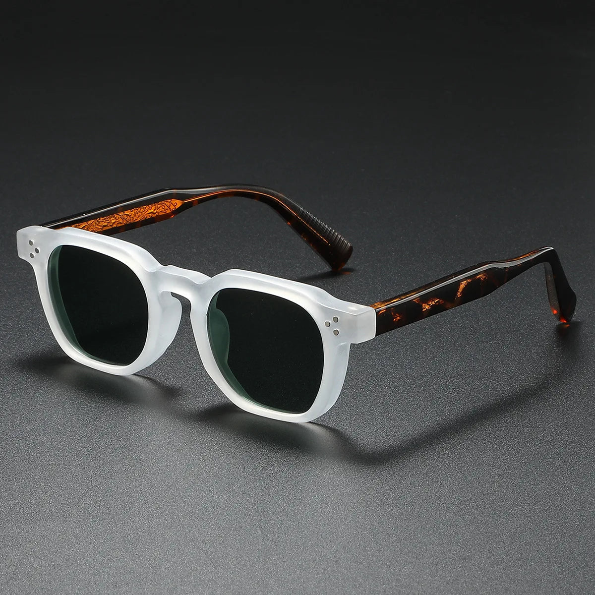 Bold black block-frame acetate sunglasses with thick retro silhouette and UV400 lens protection
