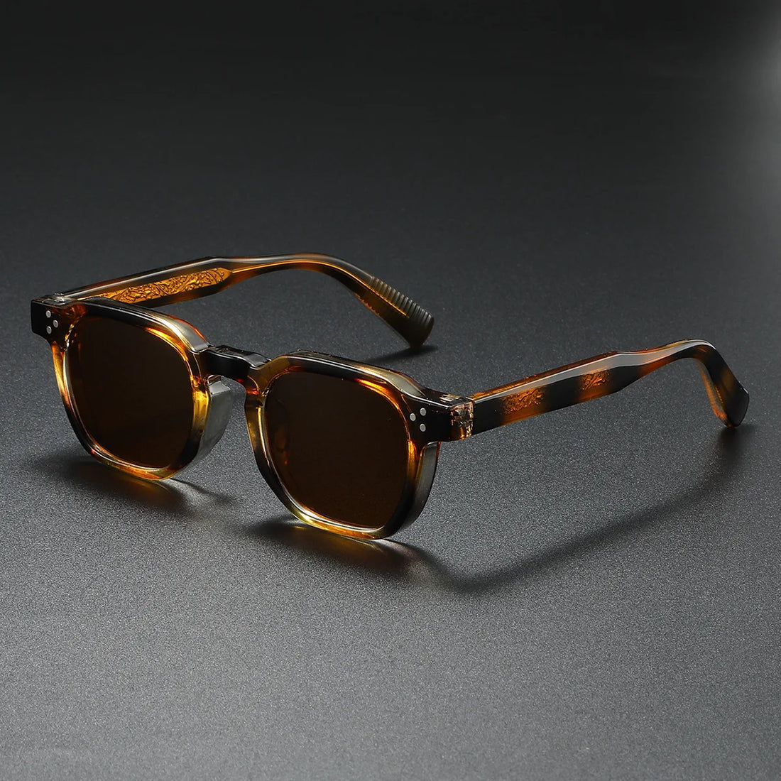 Bold black block-frame acetate sunglasses with thick retro silhouette and UV400 streetwear edge