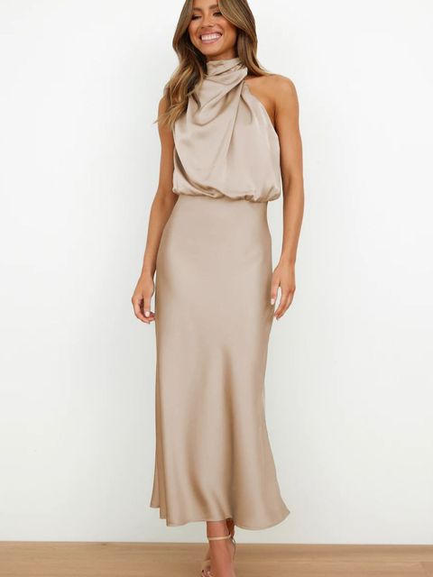 Elegant black midi cocktail dress flattering silhouette sleeveless feminine special occasion