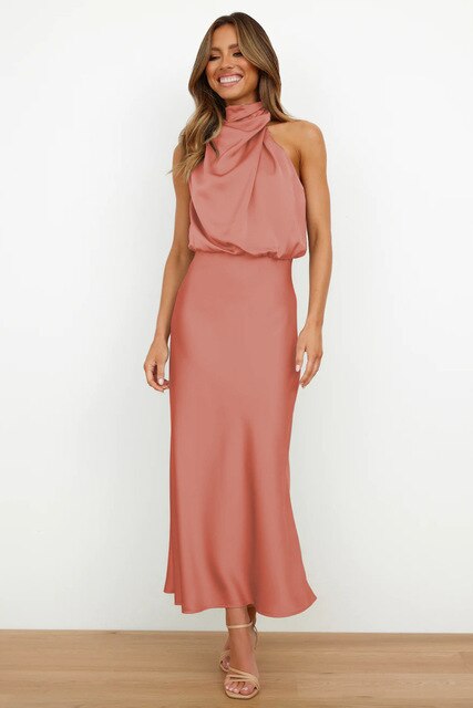 Elegant black midi cocktail dress with flattering feminine silhouette and refined glamour detailing