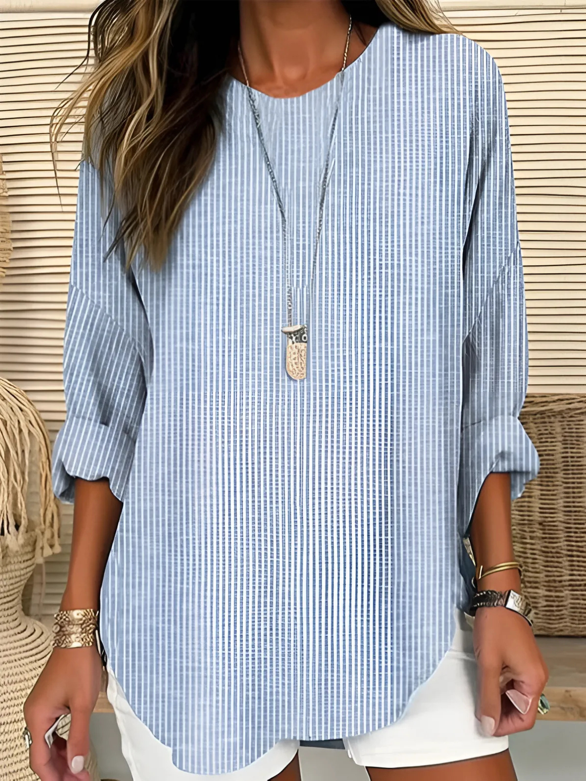 Women's relaxed-fit pullover top, soft drapey silhouette in neutral tone for effortless everyday comfort