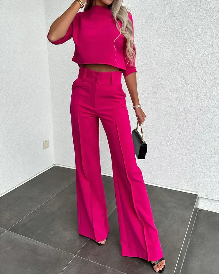 Women's two-piece crop top and pants set in coordinated style with stretchy comfortable fit