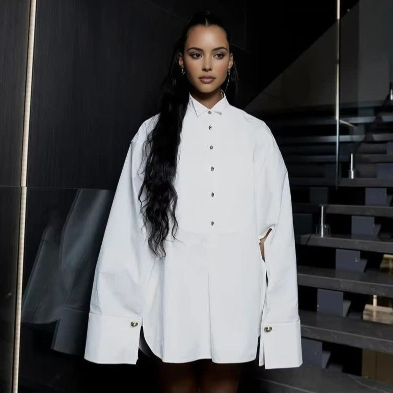 Oversized structured shirt with gold-tone hardware accents, bold modern silhouette for fashion-forward women
