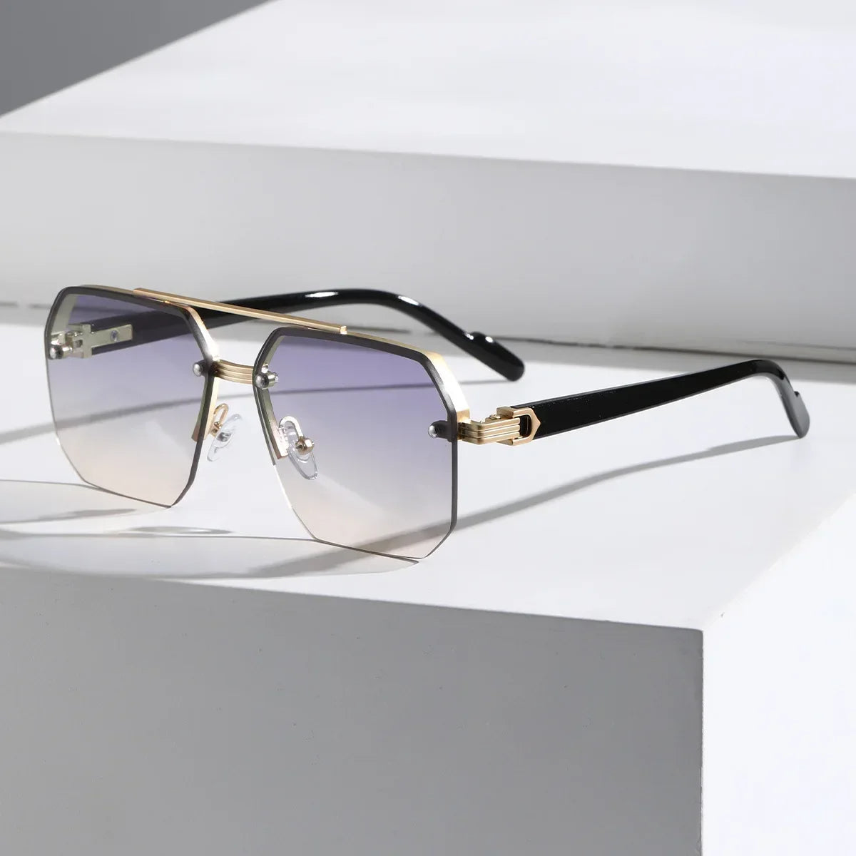 Aether geometric sunglasses UV400 gradient lenses precision-cut metal frame bold modern silhouette