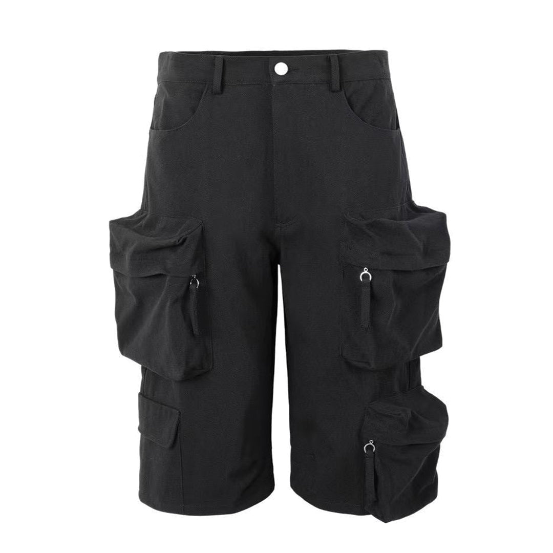 Black calf-length relaxed cargo shorts with exaggerated multi-pocket layering for streetwear