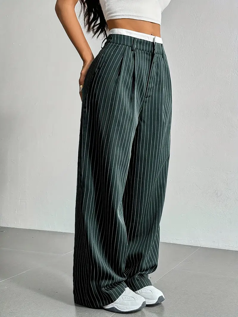 Navy pinstripe wide-leg trousers with elastic waistband, relaxed tailored silhouette for office streetwear