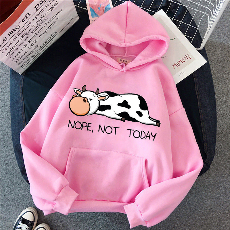 Women's relaxed fit hoodie with funny sleeping cow print and "Nope, Not Today" graphic in cozy style