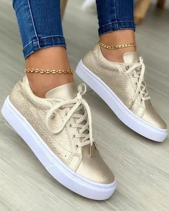 Gold-accented sneakers for adults, modern versatile style with metallic details for all-day comfort