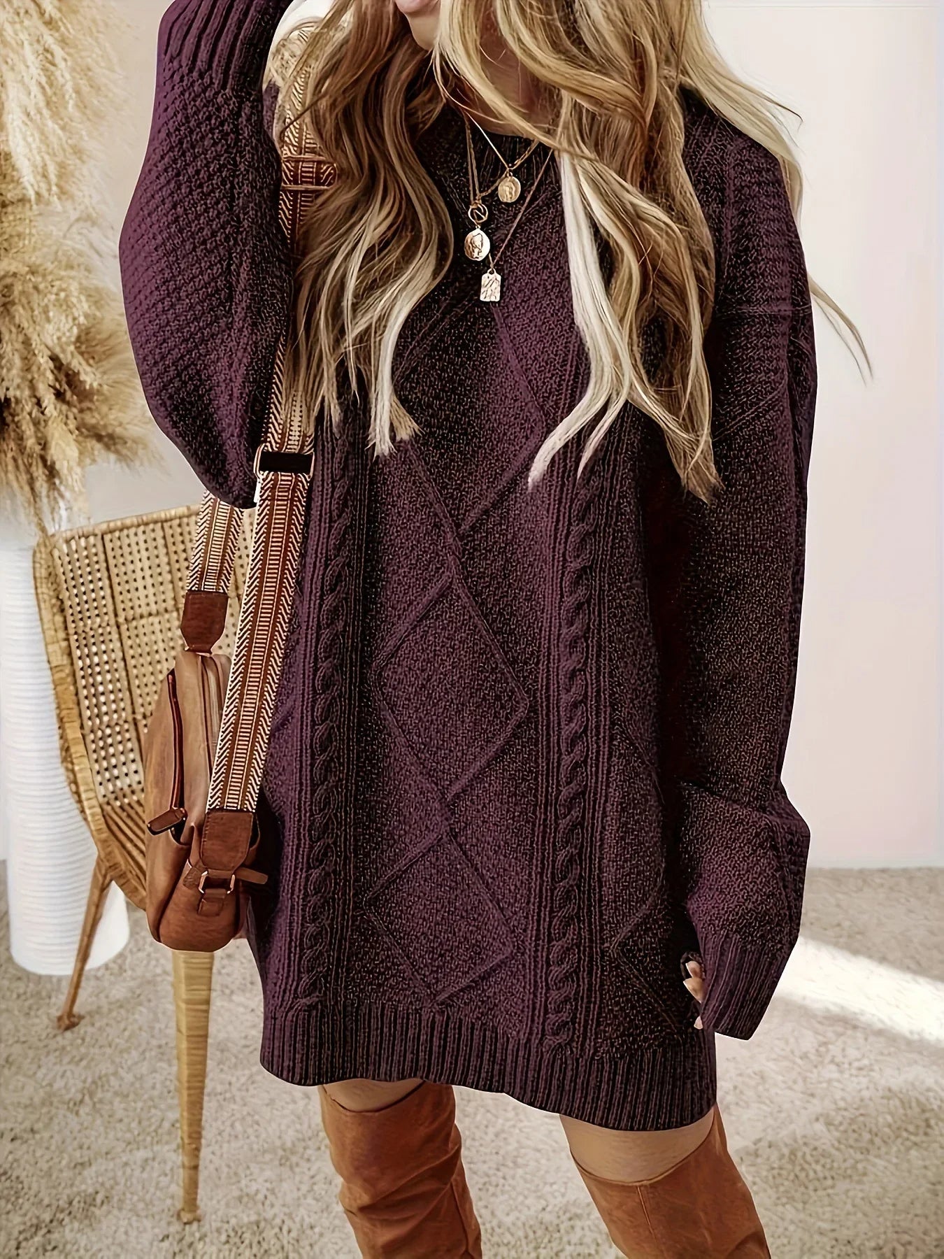Cream oversized cable knit sweater dress with drop-shoulder silhouette and plush non-itch cotton blend