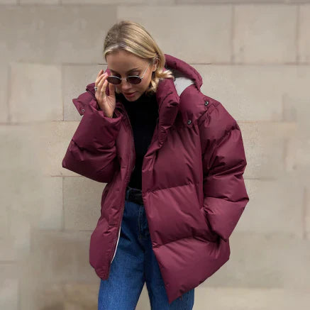 Women's oversized quilted puffer jacket midi length hooded water resistant cozy cold weather coat