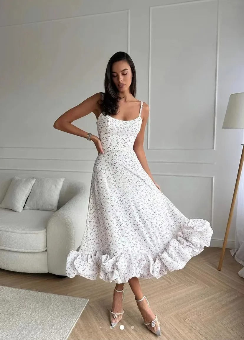 Pink elegant fitted dress with floral pattern, fine belt accent, flared skirt for special occasions