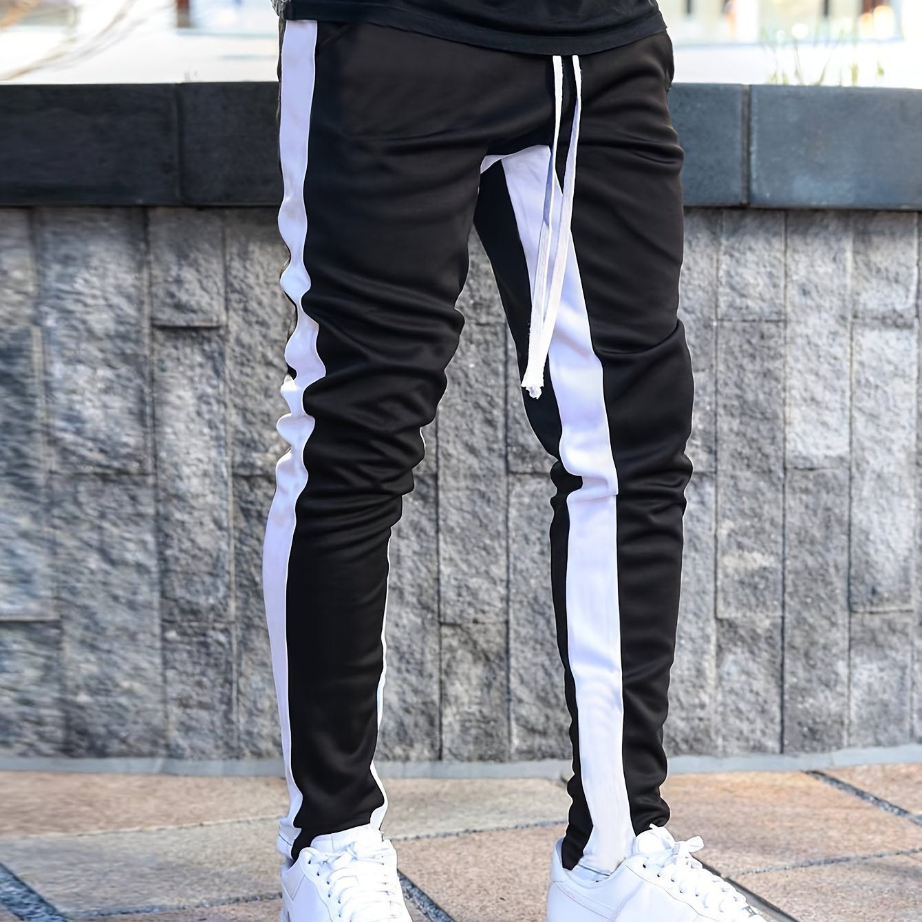 Men's regular fit joggers with sporty side stripe design for leisure and training comfort