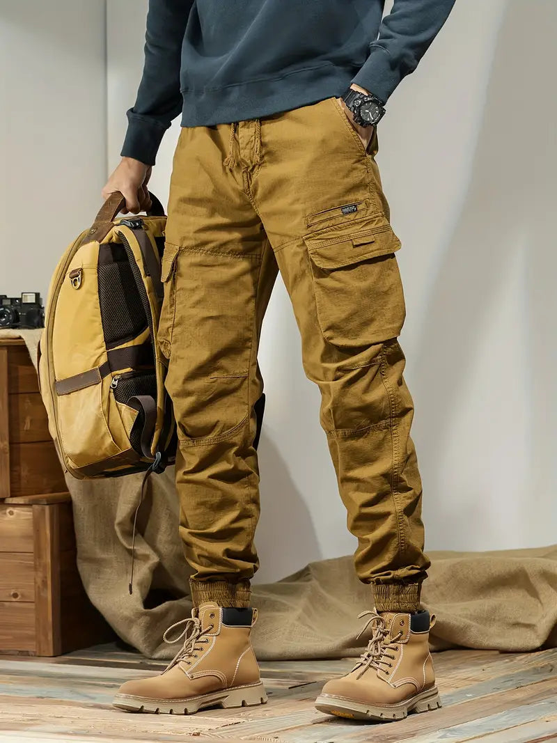 Men's rugged regular-fit cargo pants in neutral tones, cotton blend with multiple utility pockets
