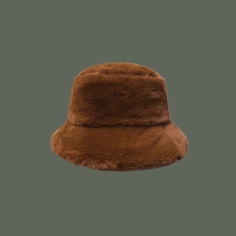 Faux fur bucket hat in leopard print plush texture cozy chic winter accessory