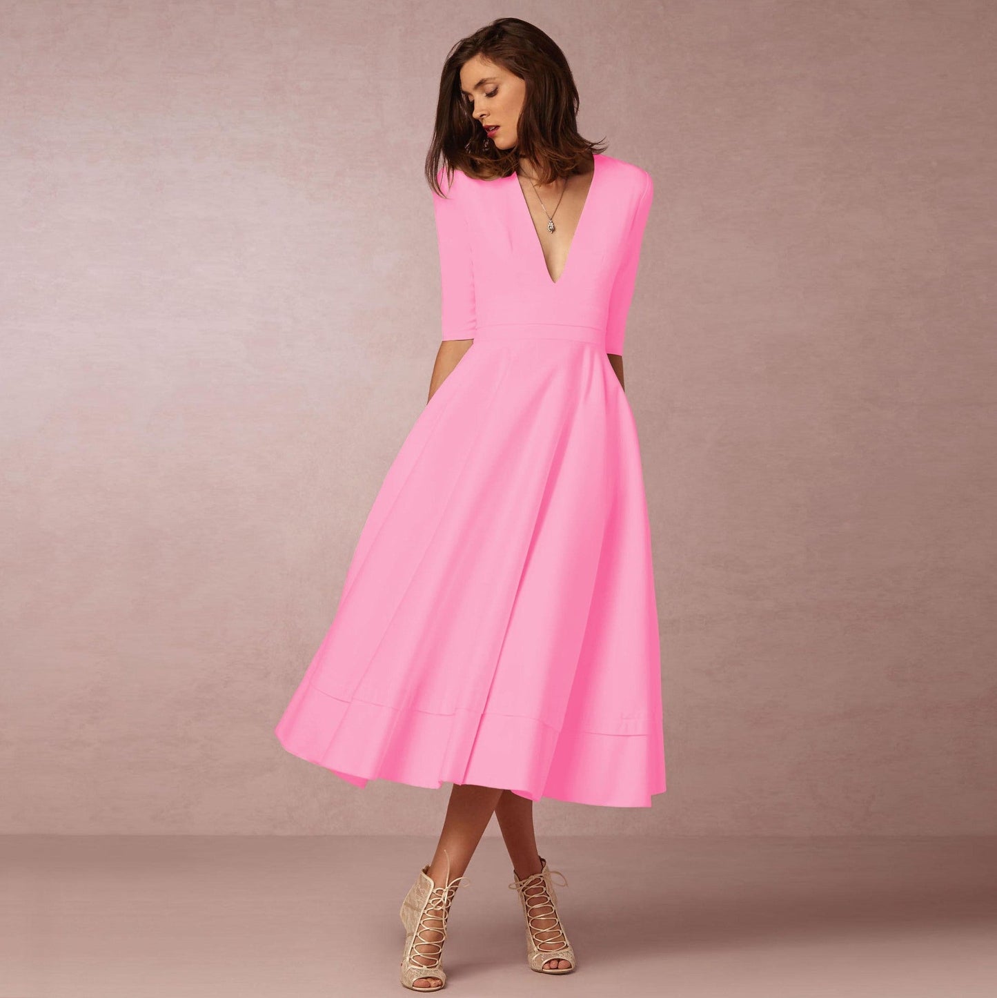 Retro 60s swing V-neck dress in vintage style with flattering flared silhouette and timeless chic fit