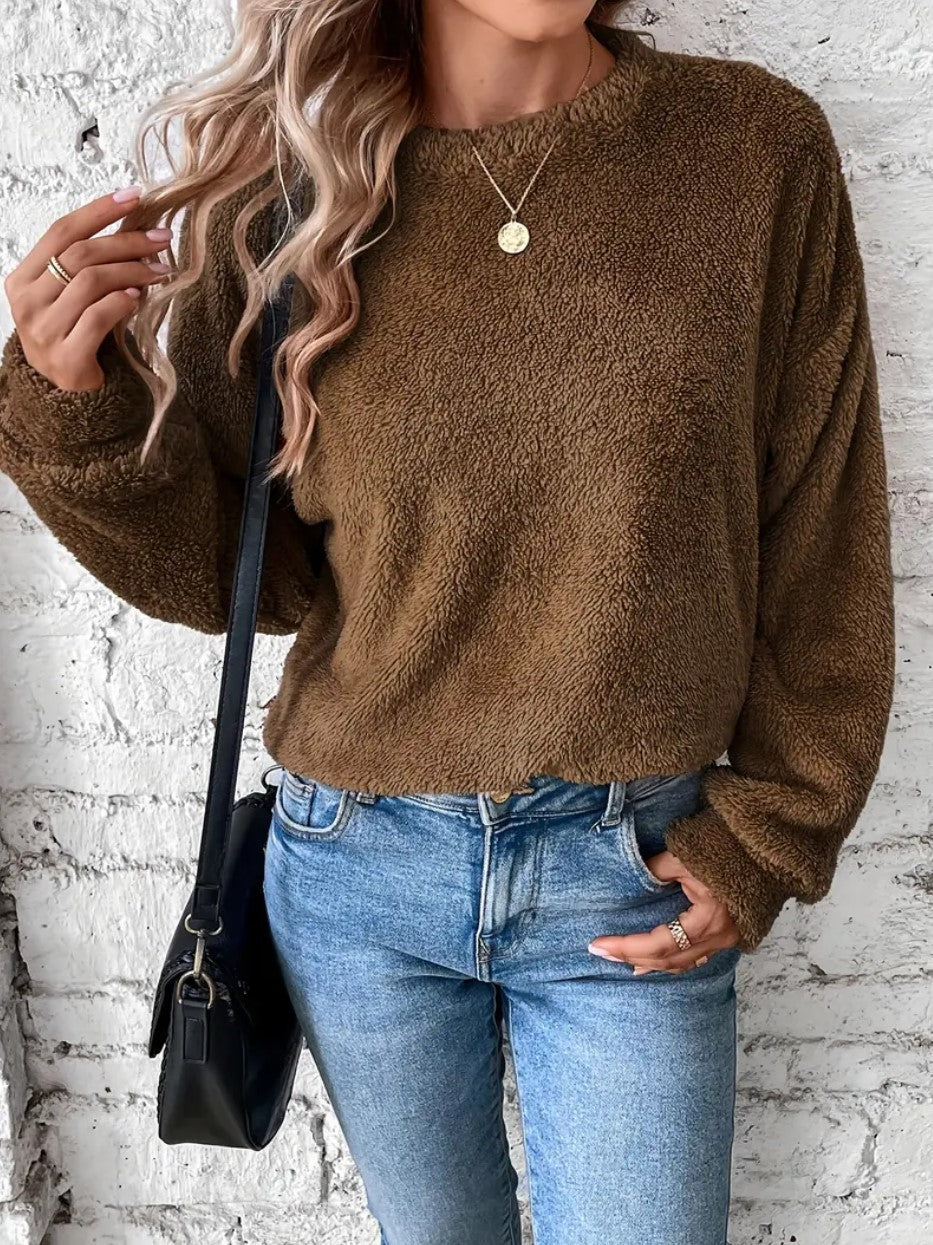 Women's ultra-soft teddy fleece sweatshirt in cozy modern fit, warm plush fabric for cold days