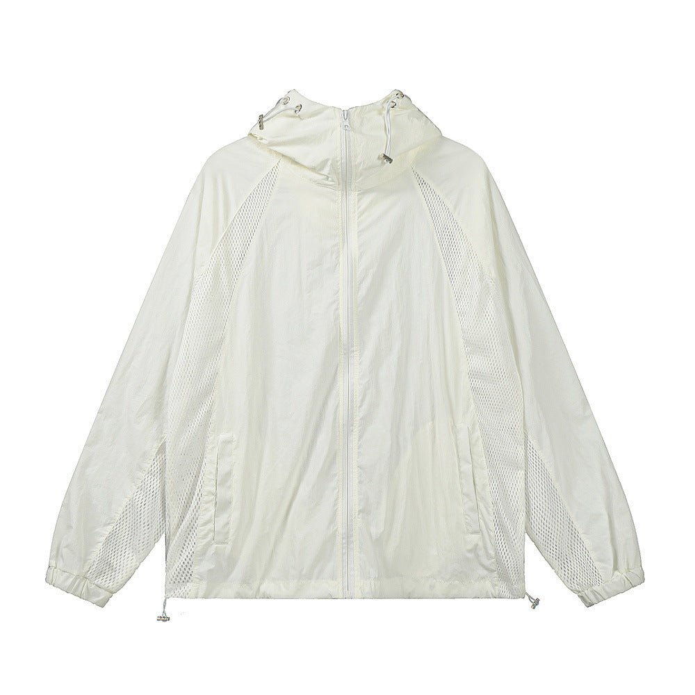 Lightweight packable hooded windbreaker in breathable polyester, slim fit for travel and outdoor activities