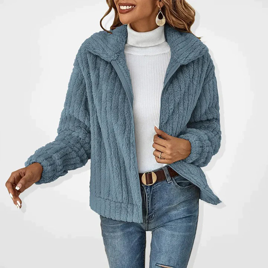 Women's black zip-up winter jacket with high collar, soft premium fabric, modern elegant fit