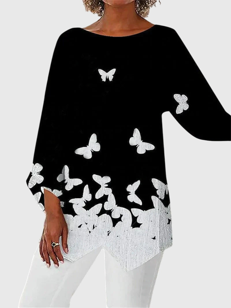 Women's ivory flowing blouse with subtle sparkle accents, relaxed silhouette for modern everyday style