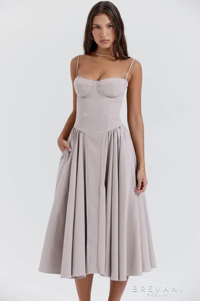 Black corset midi gown with sculpting bodice and flowing skirt for elegant evening wear