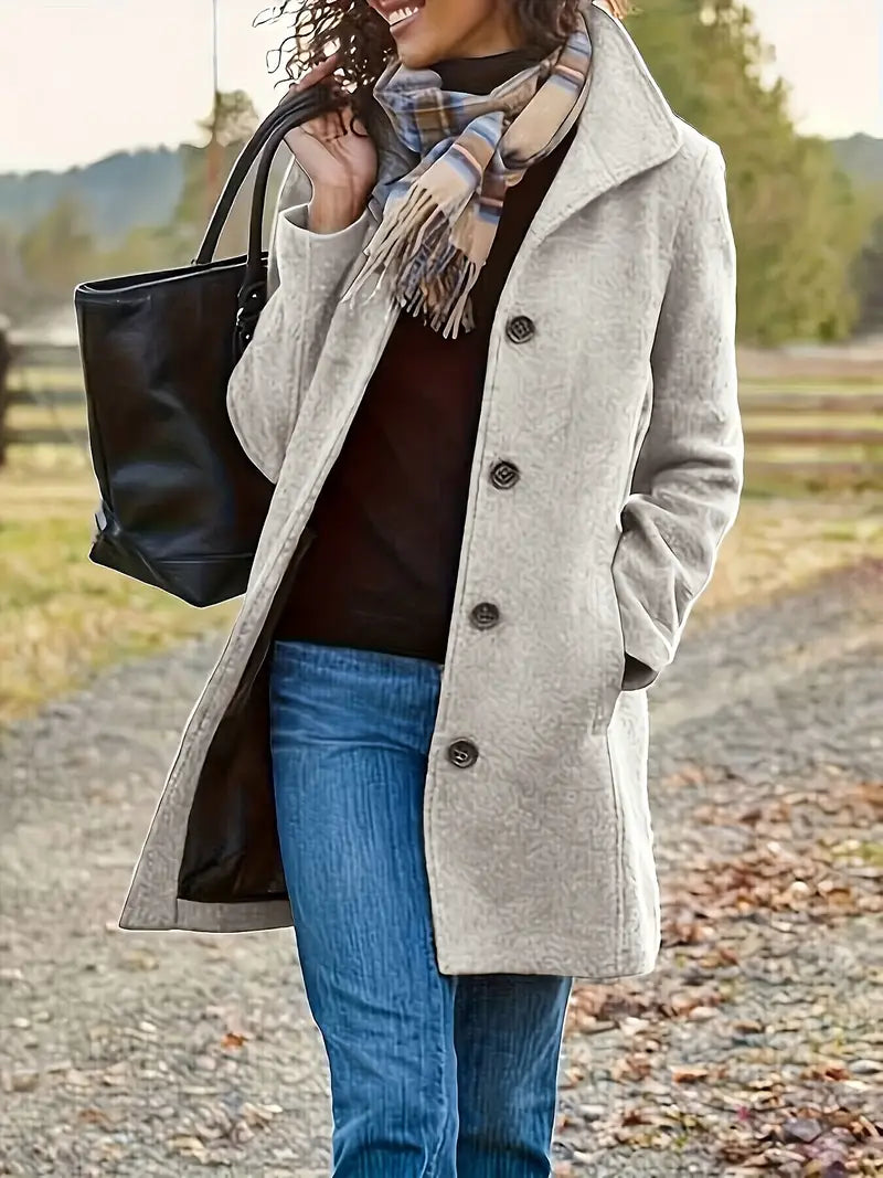 Women's tailored winter button-up coat in classic style with refined front closure for cold weather