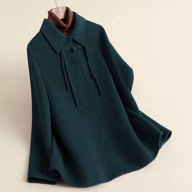 Women's relaxed fit cape coat collared thigh-length silhouette with frog closure refined details